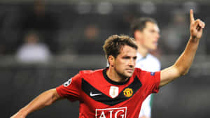 English Footballer Michael Owen Pointing Up Wallpaper