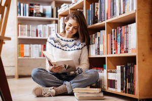 Engrossed Readerin Library Wallpaper