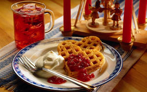 Enjoy A Delightful Waffle Topped With Frozen-inspired Compote. Wallpaper