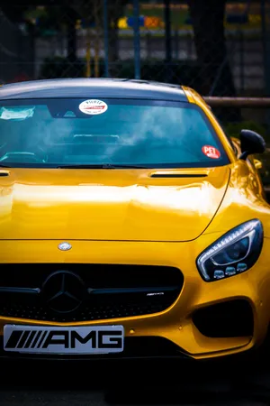 Enjoy The Elegance Of A Classic Mercedes With The Convenience Of An Iphone Wallpaper