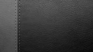 Enjoy The Luxury Of Black Leather. Wallpaper
