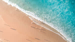 📸 Enjoy The Tranquility Of A Peaceful Beach Day Wallpaper