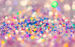 Enjoy The Vibrancy Of Life With Beautiful Desktop Colorful Glitters Wallpaper