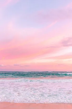 Enjoying A Calm And Pastel-hued Beach Wallpaper
