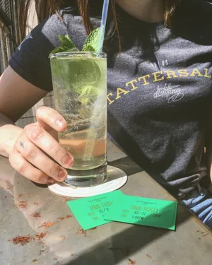 Enjoying A Refreshing Mojito At Tattersall Distilling Wallpaper