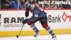 Enticing Snapshot Of Mikko Rantanen Cheekily Sticking Out His Tongue During An Intense Game Wallpaper