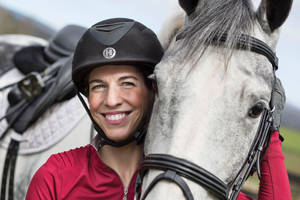 Equestrian Stephanie Bajo With White Horse Close Up Wallpaper