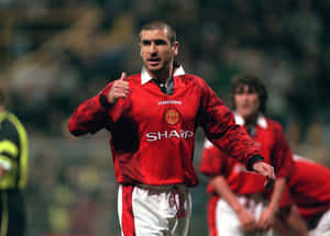 Eric Cantona Thumb Up Wallpaper