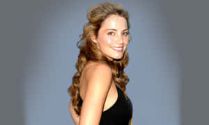 Erica Durance Smiling Black Dress Wallpaper