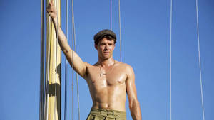 Errol Flynn Shirtless On A Ship Wallpaper