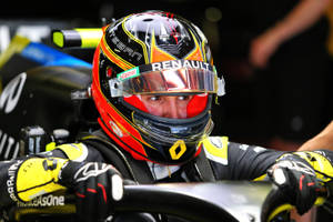 Esteban Ocon Expertly Piloting His Race Car Wallpaper