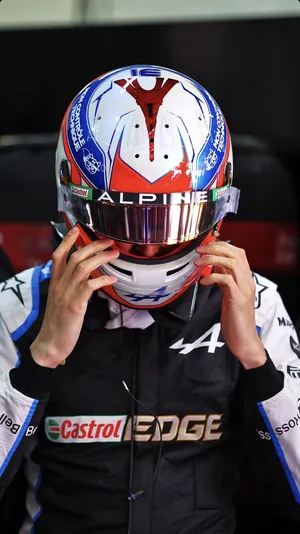 Esteban Ocon Removing Helmet Wallpaper