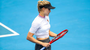 Eugenie Bouchard Wearing A Black Visor Wallpaper