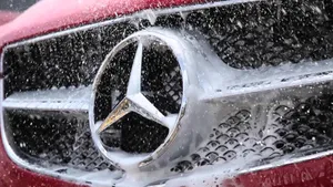 Exceptional Red Mercedes Undergoing Professional Car Detailing Wallpaper