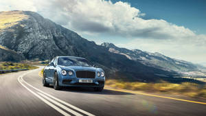 Experience Luxury And Performance With The Bentley Flying Spur Wallpaper