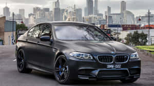 Experience Luxury And Power In The Bmw M5 Wallpaper
