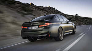 Experience Luxury Driving With The Bmw M5 4k Wallpaper
