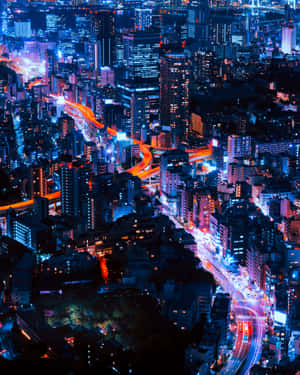 Experience The Buzzing Energy Of Neon City Wallpaper