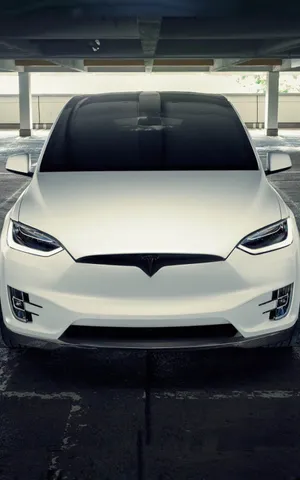 Experience The Future Of Smartphones With Tesla Iphone Wallpaper