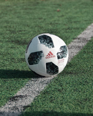 Experience The Magic Of The Fifa World Cup With The Official Match Ball From Adidas Wallpaper