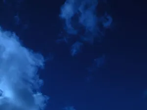 Explore An Interesting Indigo Aesthetic Through An Ethereal And Colorful Landscape Wallpaper