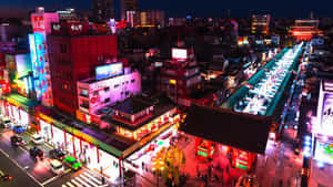 Explore The Energy And Experiences Of Tokyo's Vibrant Harajuku District. Wallpaper