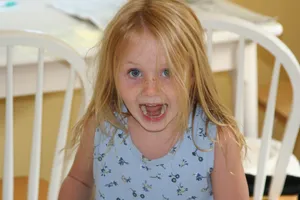 Expressing Frustration: Man With Head In Hands Wallpaper