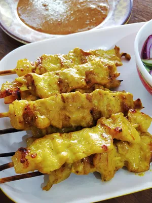 Exquisite Chicken Satay - A Feast For The Eyes And Taste Buds Wallpaper