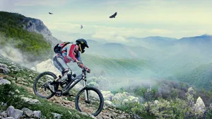 Extreme Hillside Mountain Biking Wallpaper