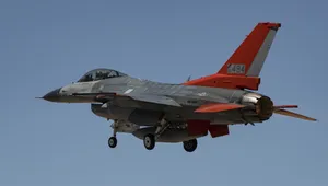 F-16 Fighter Jet In Red Wallpaper