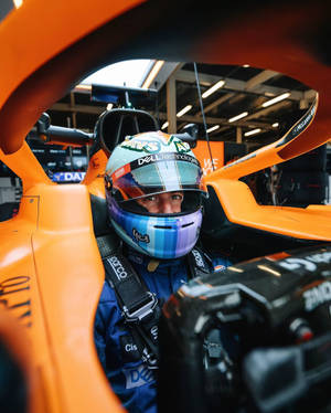 F1 Star Daniel Ricciardo Smiling With Helmet Wallpaper