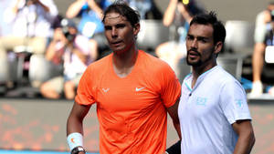 Fabio Fognini Powering Through A Tennis Match Wallpaper