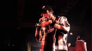 Fans Experiencing A Night To Remember At A Travis Scott Concert Wallpaper