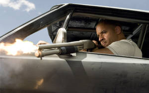 Fast And Furious Dom With Shotgun Wallpaper