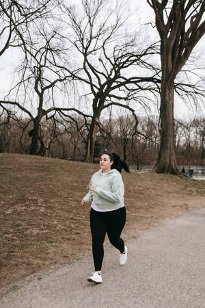 Fat Woman Jogging Wallpaper