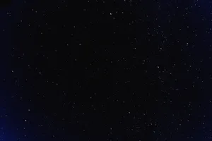 Feel The Calm And Captivating Night Sky Wallpaper