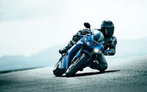 Feel The Freedom Of The Open Road On An Hd Motorcycle Wallpaper