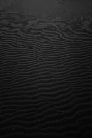 Feel The Soft Yet Luxurious Touch Of Black Leather Wallpaper