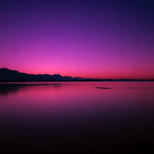 Feeling The Beauty Of A Blue And Purple Sunset Wallpaper