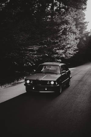 Feeling The Wind While Cruising In A Bmw Wallpaper
