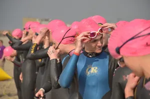 Female Athletes In The Triathlon Wallpaper