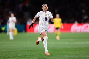 Female Soccer Player Celebration Wallpaper