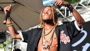 Fetty Wap Dynamically Rapping On Stage Wallpaper