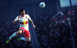 Fifa 21 Football Player Midair Football Kick Wallpaper