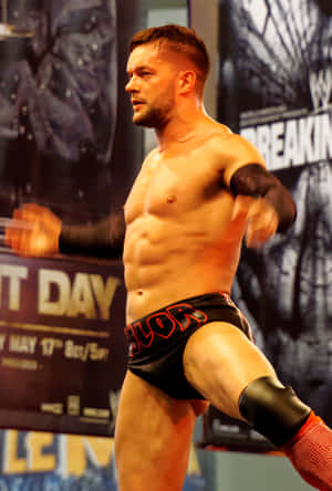 Finn Balor In Action - The Enigmatic Extraordinaire Of Wwe Wallpaper