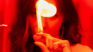 Fire Girl With Flaming Finger Wallpaper