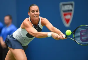 Flavia Pennetta In Action On The Tennis Court Wallpaper