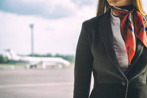 Flight Attendant Ready To Serve Wallpaper