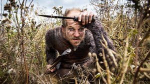 Floki From Vikings In Bushes Wallpaper