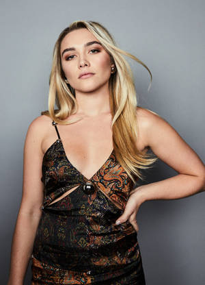 Florence Pugh Striking A Pose At The Wrap Event Wallpaper